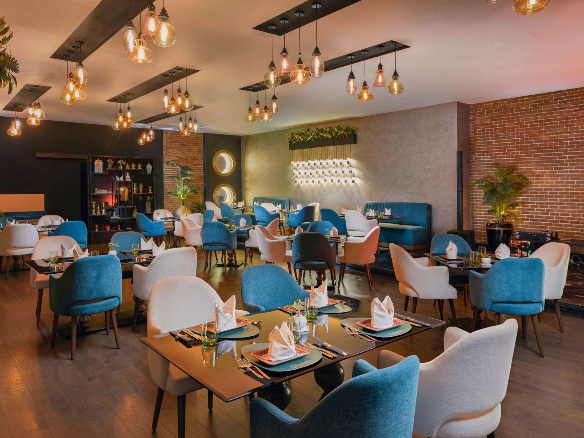 Moevenpick Hotel Cairo - Media City Giza Ngoại thất bức ảnh The restaurant
